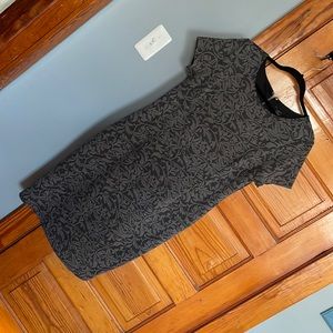 Beautiful grey dress with a fabulous embroidered pattern.